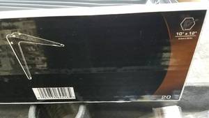 lot 875 image: (25) Grey Shelf Brackets 10 x 12