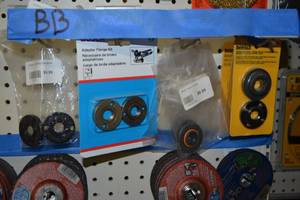 lot 562 image: Lot of Angle Grinder Flange Kits and More