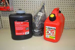 lot 665 image: 1.6 Gallon Dual Compartment Fuel Can, 12 Quart Oil Disposal Can and (3) Funnels