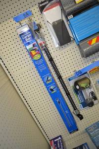 lot 690 image: Truck Bed Cargo Securement Bar 40 to 70 and Clothes Bar