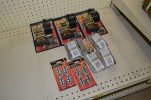 lot 697 image: (8) Ratcheting Straps and (2) Packs of Tie Downs
