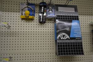 lot 696 image: Reese Universal Coupler Lock, (2) Hitch Pin Locks and More