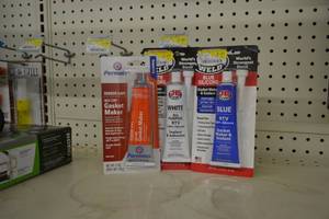 lot 715 image: (3) 3oz JB Weld and Permatex Gasket Makers