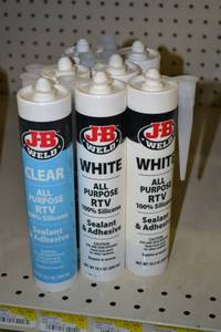 lot 716 image: (7) Bottles JB Weld RTV Sealant and Adhesive