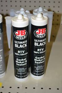lot 713 image: (4) JB Weld Ultimate Black Gasket Maker and Sealant