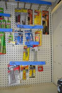 lot 719 image: Inventory of Auto Electric Testers, Adhesives and More