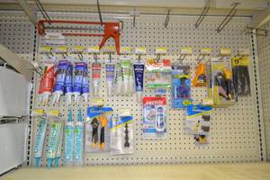 lot 789 image: Contents on Pegboard Adhesives, Caulking Tools and More