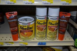 lot 1798 image: (5) Cans Zinsser Bulls Eye Shellac, 1 Quart Zinsser Bulls Eye Shellac, 2 Tubes of Elmers Wood Filler