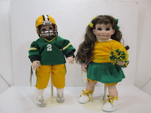 lot 60 image: Hand Painted Signed Dated Green Bay Packers Dolls