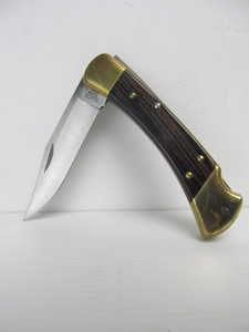 lot 79 image: Nice Vintage Model 110 Folding Buck Knife