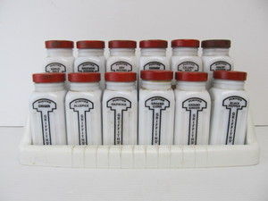 lot 208 image: Vintage Deco Milk Glass GRIFFITHS Spice Jar Set wStand
