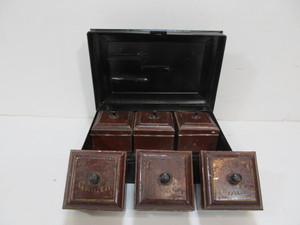 lot 244 image: Antique Portable Metal Spice Tin Canister Set