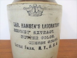 lot 53 image: Antique Hansens Laboratory Rennet Extract 1 Gallon Stoneware Advertising Jug