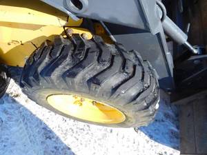 lot 1 image: New Holland skid loader LS170