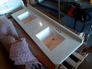 Double Sink - 73 long x 22 deep x 10 high from bottom of sink drain to top of backsplash