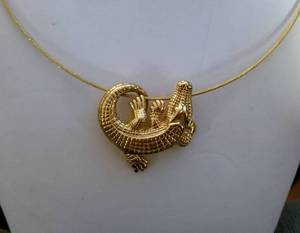 lot 1 image: 14K Yellow Gold Necklace with 14K Alligator Pendant by Carla