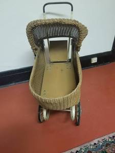 lot 106 image: Antique Wicker Toy Baby Buggy