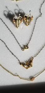lot 7 image: 10K BHG Butterfly Pendant and 12K GF Black Hills Gold Earrings & Necklaces