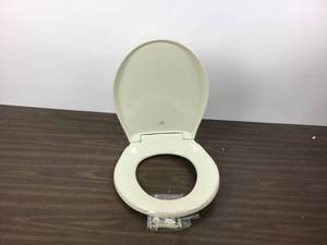 lot 23 image: Church Affinity Round Closed Front Toilet Seat In Almond