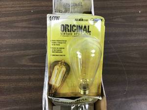 lot 40 image: Feit Electric 40W Equivalent ST19 Dimmable Incandescent Amber Glass Vintage Edison Light Bulb With Cage Filament Soft White