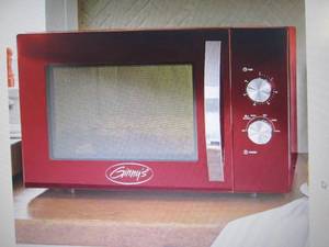 lot 34 image: Ginnys 1.2 Cu. Ft. Microwave open ...