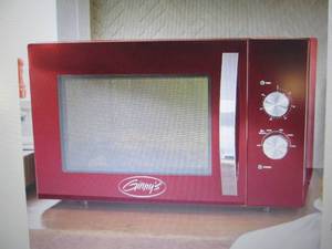 lot 98 image: Ginnys 1.2 Cu. Ft. Microwave open ...