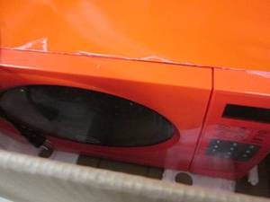 lot 99 image: Ginnys .9 Cu. Ft. Retro Microwave ...