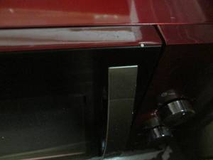 lot 107 image: Ginnys 1.2 Cu. Ft. Microwave open ...