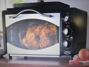 lot 110 image: Ginnys 10-In-1 Everything Oven ope...