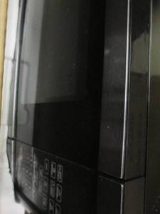 lot 211 image: Ginnys Microwave open box, used...
