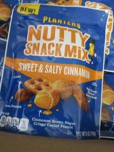 lot 321 image: Case of 8- 6 oz Planters Nutty Snac...