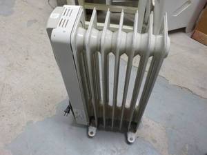 Oil Electric Heater, powers on...