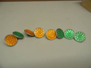 lot 45 image: VINTAGE YELLOW & GREEN RAISED REFLECTORS - BIKECARMOTORCYCLE - SEE PICTURES