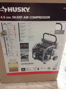 Husky 4.5 Gal. Portable Electric-Powered Silent Air Compressor  in good condition