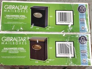 lot 37 image: Gibraltar Mailboxes Designer Black Satin Nickel Decorative Emblem Vertical Wall-Mount Locking Mailbox in good condition
