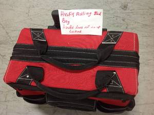 lot 90 image: HUSKY ROLLING TOOL BAG HANDLE DOES NOT GO UP LOCKED