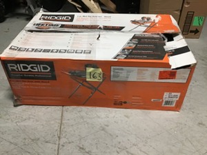 lot 163 image: RIDGID 9 Amp Corded 7 in. Wet Tile Saw with Stand not used