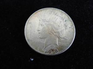 lot 15 image: Peace Dollar 1928