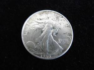 lot 38 image: Walking Liberty Half Dollar 1938
