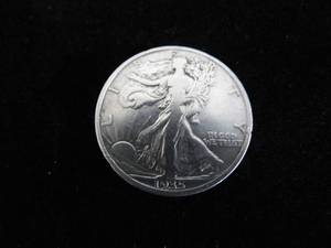 lot 54 image: Walking Liberty Half Dollar 1935