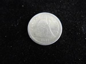 lot 69 image: Seated Liberty Quarter 1877