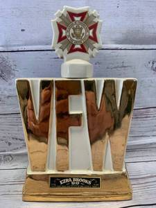 lot 66 image: Ezra Brooks 24kt Gold Plated Antique Decanter