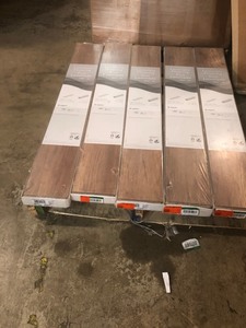 lot 31 image: Lot of 5 cases Home Decorators Collection Sonoma Oak 8 mm Thick x 7-23 in. Wide x 50-58 in. Length Laminate Flooring (21.48 sq. ft.  case)