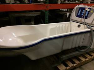 lot 67 image: MSRP $20,000&nbspRhapsody Height-Adjustable Bathing System by ArjoHuntleigh - WAS IN WORKING ORDER WHEN IT WAS REMOVED HOWEVER MISSING BACK COVER NOW