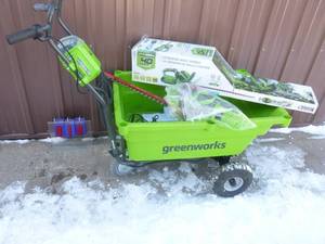 Greenworx 40 volt powered dump yard cart with 40 volt hedge trimmer. Includes battery & charger. Tested & works. As shown.
