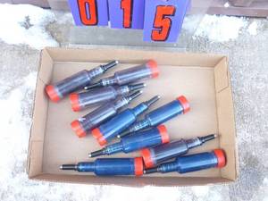 Chainsaw grease guns. As shown.