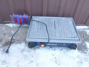 Kobalt tile saw. Needs assembly. Looks complete. Tested & works. As shown.