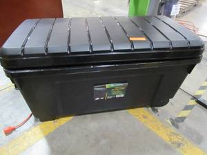 lot 274 image: 169 Qt. Remington Store-It-All Tote Storage Bin in Black, 296003 - Cracked handle and crack in wall near handle.