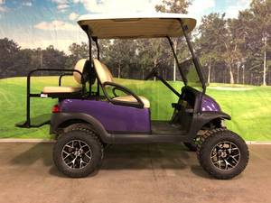Purple Lifted Club Car Precedent Four Passenger Golf Cart