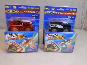 2 New Magic Tracks RC Cars